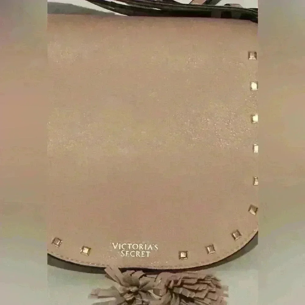 A Victoria’s Secret light pink crossbody bag w/ tassels. - Picture 2 of 9